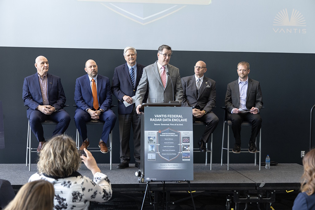 Andy Armacost speaks during a press conference