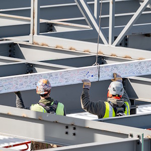The final beam being installed during construction