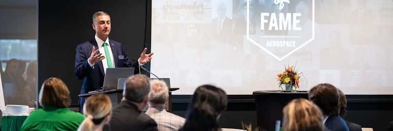 Dean Kraus addresses attendees at the UND Aerospace Hall of Fame event