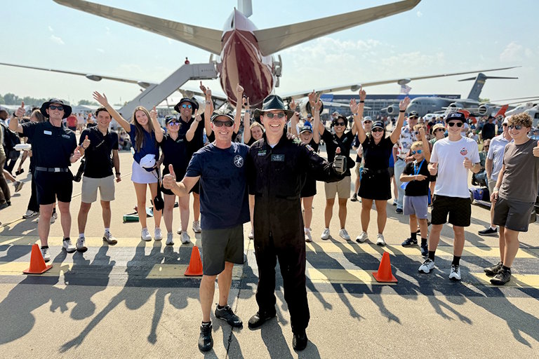 Jeff Boerboon and Michael Lents celebrate at EAA AirVenture Oshkosh